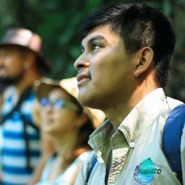 Man with group in forest